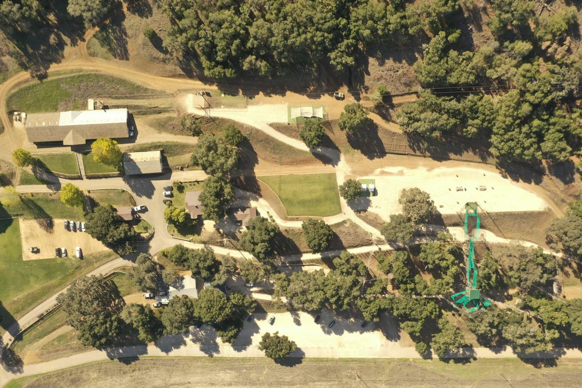 Aerial view of the Highline Adventures base camp and Adventure Park in the oak grove.